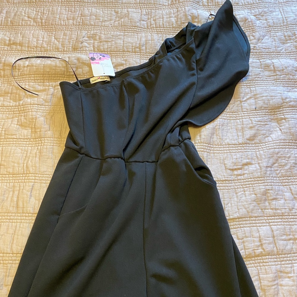 Black one shoulder jumpsuit with pockets! Never been worn